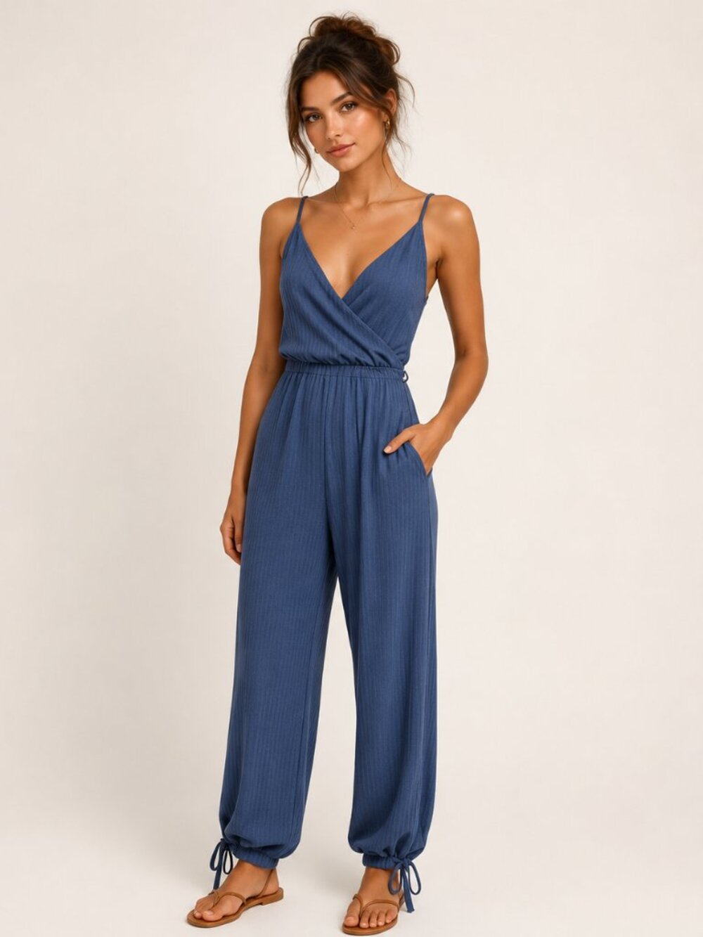 Blue jumpsuit sleeveless tie at the bottom Rolla Coster brand